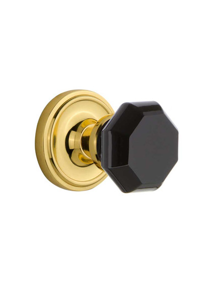 Classic Rosette Door Set with Colored Waldorf Crystal Glass Knobs Black in Un-Lacquered Brass.